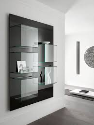 Glass showcase designs for living room wall mounted the modern showcase unit in wood contrasts wonderfully against the pattern. Glass Showcase Designs For Living Room Wall Mounted