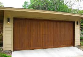 Wooden Garage Doors With Vertical Design Home Interiors Wooden Garage Doors Wooden Garage Garage Doors