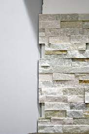 To know more about them please visit : How To Install Stacked Stone Tile On A Fireplace Wall Thrifty Decor Chick