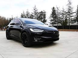 tesla s model x suv is finally here and it s as wonderful as we d hoped tesla model x tesla tesla model