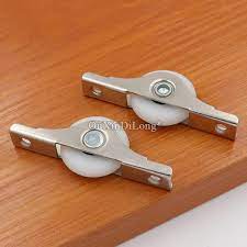 Sliding door systems (furniture wood doors) sliding door systems (furniture glass and wood doors) floor sliding system (wood or aluminum doors) more. Brand New 20pcs Sliding Door Rollers Cabinet Nylon Wheels Pulleys Runners For Wardrobe Cupboard Window Furniture Hardware Door Rollers Aliexpress