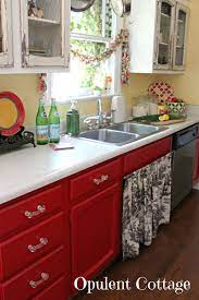 It's easy to give your kitchen a makeover with painted cabinets using heirloom traditions' chalk type paints | diy cabinets. Opulent Cottage Our New Red Kitchen Cabinets Red Kitchen Cabinets Red And White Kitchen Cabinets Painting Kitchen Cabinets