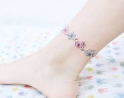 Small Tattoo Cost It May Not Always Be Less Money Ankle Bracelet Tattoo Wrist Bracelet Tattoo Tattoo Bracelet