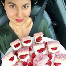 Baby raspberry white chocolate lamingtons (a recipe from Let's eat!) went  down a treat at a potluck tonight. Want me to show you how to make em in  20min? Join me on