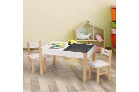 This table has some plastic bins organized in its base, and its owners used them to store legos. Kidbot Multifunctional Kids Table And Chairs Set Chalkboard Toys Play Storage Desk Matt Blatt