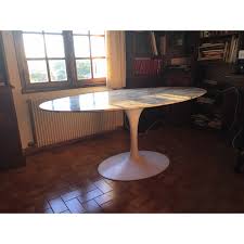 Early knoll saarinen tulip table, cast iron base, oval laminate top. Preloved Dining Tulip Table By Knoll