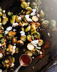Crispy Brussels Sprouts With Goat Cheese A Couple Cooks Recipe Brussel Sprout Recipes Roasted Sprout Recipes Roasted Brussel Sprouts Oven