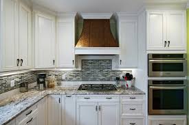 Sinda h11st hand hammered under cabinet copper range hood. Traditional Kitchen With White Cabinetry Copper Range Hood Hgtv