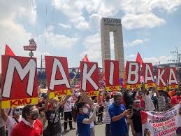 Labor rights advocates hold a protest at the department of labor and employment in intramuros, manila on april 27, 2021. Workers Thwart Police Attempt To Stop Labor Day Protests Philstar Com