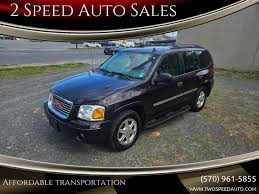 Image result for Black 2009 Envoy