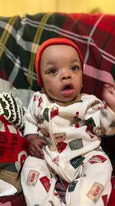 Nathaniel Wright was all smiles during his first Christmas at home in  Orlando with his mom and dad. Born almost four months premature in November  2024, Nathaniel was still in the NICU