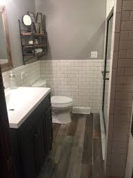 Remodel Modern Rustic Bathroom With White Subway Tile And Reclaimed Wood Ceramic Tile Floor Small Farmhouse Bathroom Wood Tile Bathroom Bathrooms Remodel