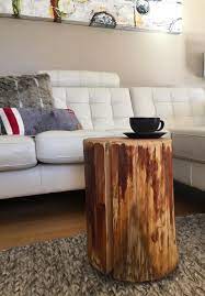 Our rustic coffee table features a solid wood top with log edging. Stump Side Table Log Side Tables Rustic Coffee Table Tree Trunk Table Wood Block Furniture