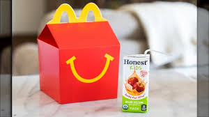 A toy is typically included with the food, both of which are usually contained in a box with the mcdonald's logo. The Positive Change Mcdonald S Is Making To Its Happy Meals