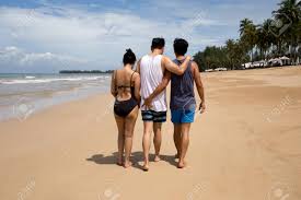 Please correct the errors below. Threesome Love Friends Of Two Men And One Woman On The Beach Stock Photo Picture And Royalty Free Image Image 94501896
