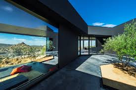 Desert home and remodel can walk you through the entire process from discussion of your vision to conceptual design and final construction. Black Desert House Oller Pejic Architecture Archdaily