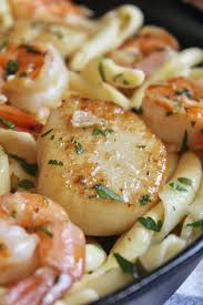 Drain the pasta and add the bertolli rosa sauce, reserved pancetta, and seafood tossing to coat well. Seafood Pasta With Shrimp And Scallops And Garlic Christina S Cucina
