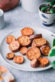The Easiest Baked Yams Recipe These Simple Roasted Crispy Sweet Potato Slices Are The Best E Baked Sweet Potato Slices Sweet Potato Slices Crispy Sweet Potato