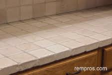 natural stone tile vs quartz kitchen