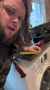 Caption- Fixing my washing machine with @screwfix_ireland #ad