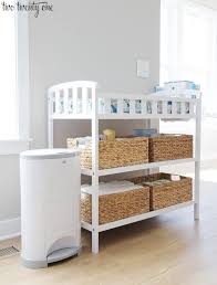 If You Have A Belly Full Of Arms And Legs I M Sure You Will Be Busy Getting The Nurser Baby Changing Tables Changing Table Organization Baby Room Organization