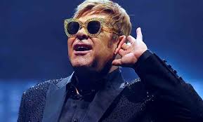 Elton John performs with walking pneumonia, the bloody trooper