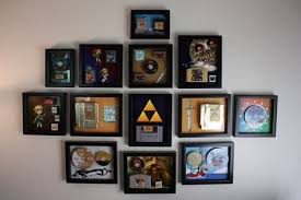 Legend Of Zelda Game Collection Transformed Into Fancy Wall Decor Geek Decor Geeky Games Legend Of Zelda