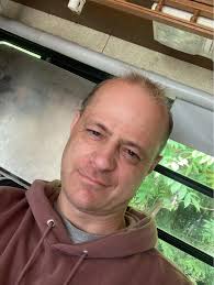 No dig gardening in pots: root system left in pot, compost added