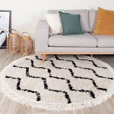 fraai rond hoogpolig vloerkleed grand wire fringe creme zwart vloerkleed vloerkleed creme slaapkamer vloerkleed