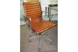 These ergonomic chairs support your posture and help you stay alert while working. Revolving Desk Chair Charles Eames Design Ribbed Tan Brown Leather Upholstered Revolving And R
