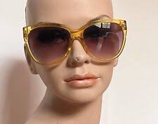 Occhiali da sole vintage hippy con mantatura in plastica