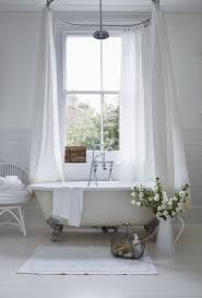 Love This Minus The Curtain Rail One Day I Will Have A Stand Alone Bath Love The Flowers In The Jug Too Home Chic Bathrooms Interior