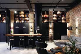 If you're renovating, consider using materials in the industrial style, such as exposed brick walls, concrete floors and exposed beams. Get The Look Chic Industrial Home Decor Pretend Magazine