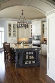 Kitchen With Pale Blue Walls And Slate Blue Island With Creamy White Cabinets Kitchen Inspiration Design Traditional Kitchen Design Kitchen Renovation