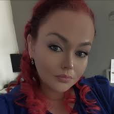 Redish card holder found near Whole Foods