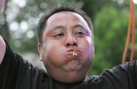 Eating champ wins fiesta jalapeno contest