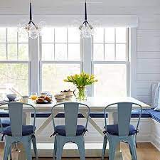 Metal chairs with simple style and black color, which will add a more classic atmosphere to your house or restaurants. Blue Metal Chairs With Blue Seat Cushions Design Ideas