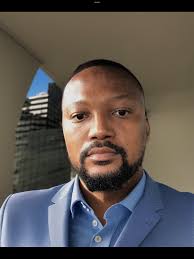 TULE MICHAEL DOOLUMUN