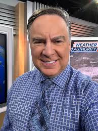 I'm channeling warmth by wearing a tie that has a palm tree design!