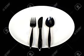 A White Plate And Utensils On A Black Background Stock Photo Picture And Royalty Free Image Image 22035744 Black plastic cutlery and utensils are a stylish choice for your restaurant.