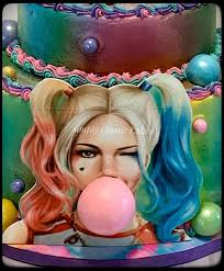 This cake was a true labor of love for me. I designed and created this  Harley Quinn inspired cake for my daughter's 33rd birthday celebration  today. This is her favorite DC Comics