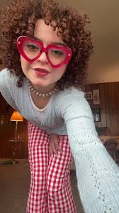 Girl with Curly Hair and Funky Outfits