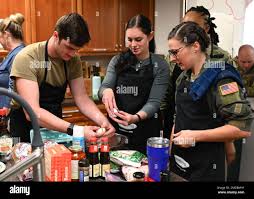 U.S. Air Force Capt. Molly Dunkelberger, 17th Medical Group aerospace nurse  practitioner, leads a meal preparation class at Taylor Chapel, Goodfellow  Air Force Base, Texas June 28, 2022. Dunkelberger held the class