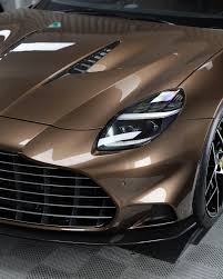 Image result for Bronze Flare 2025 Aston Martin