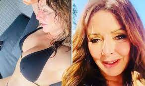 Carol vorderman, 60, teases a glimpse of her ample cleavage as she slips into a neon pink wetsuit and enjoys a paddle boarding trip in wales. Carol Vorderman 60 Issues Apology For Her Bikini Mishap As Racy Picture Causes A Stir Celebrity News Showbiz Tv Express Co Uk