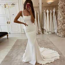 Created for the bride who loves to flaunt it, this formfitting mermaid wedding dress exaggerates curves with a dramatic trumpet skirt, made even fuller with a horsehair hem. Plain Crepe Mermaid Wedding Dress 2021 Straps Square Neck Long Train Fish Tail Bridal Gown Marriage Bride Wedding Dresses Aliexpress