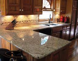 Santa Cecilia Granite Installed Design Photos And Reviews Granix Inc Granite Kitchen Giallo Ornamental Granite Kitchen Countertops Granite Backsplash