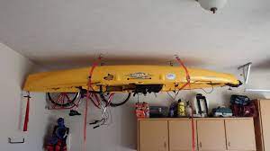 Mounting the structure to the ceiling of your garage can be tricky, so you'll want to make sure you're carefully laying out your project. Diy Kayak Ceiling Storage Google Search Diy Kayak Storage Kayak Storage Garage Kayak Storage