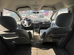 Image result for Deep Coral Red 2007 Caravan