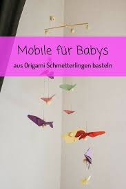 Eine einfache anleitung zum basteln süßer schmetterlinge. Diy Mobile Fur Babys Aus Origami Schmetterlingen Mit Video Origami Schmetterling Mobile Basteln Basteln